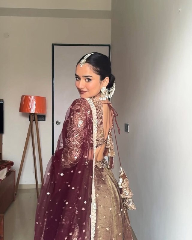 Regal Glow Maroon & Gold Embellished Lehenga Ensemble