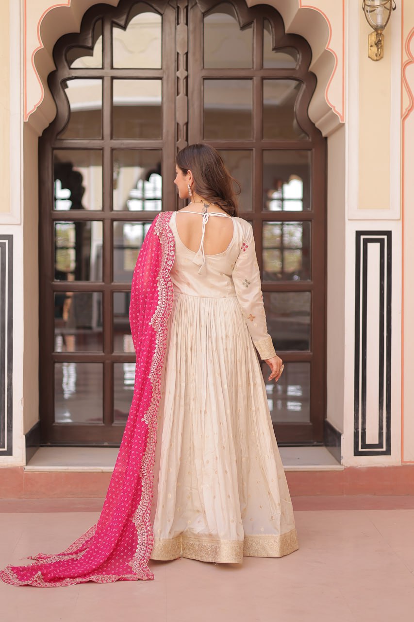 Navrang Elegance Cosmos Jequard With Bandhani Printed Embroidered Cut work Gown