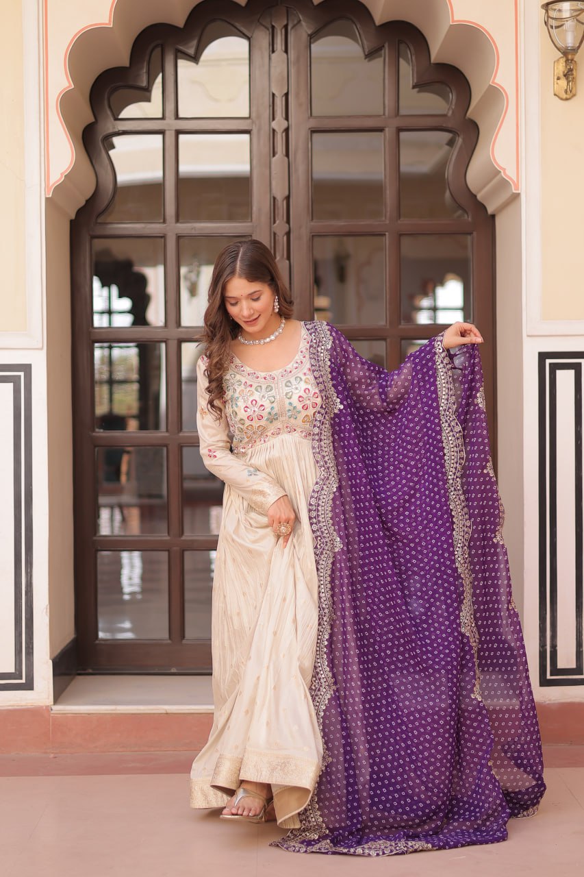 Navrang Elegance Cosmos Jequard With Bandhani Printed Embroidered Cut work Gown