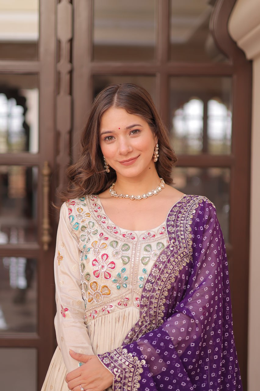 Navrang Elegance Cosmos Jequard With Bandhani Printed Embroidered Cut work Gown