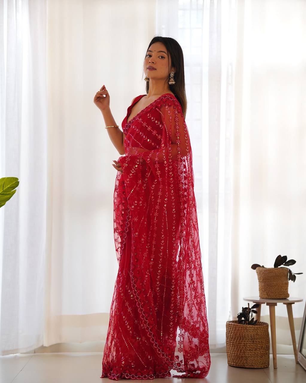 Radiant Bloom Timeless Red Net Saree