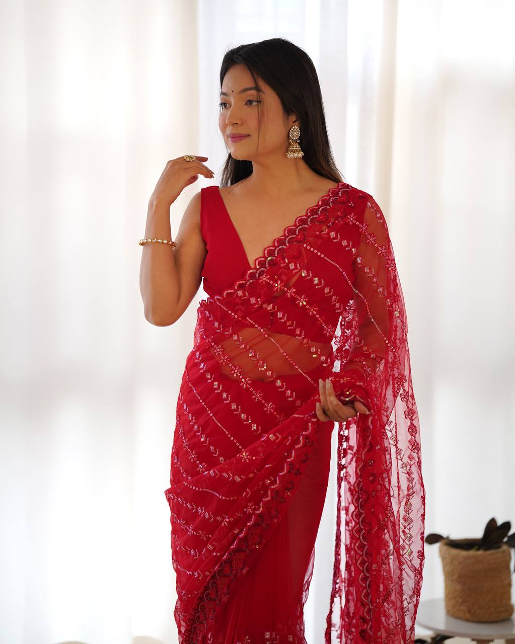 Radiant Bloom Timeless Red Net Saree