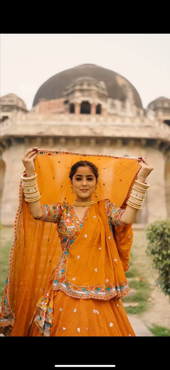 Kesar Charm Mustard Orange Festive Lehenga Choli