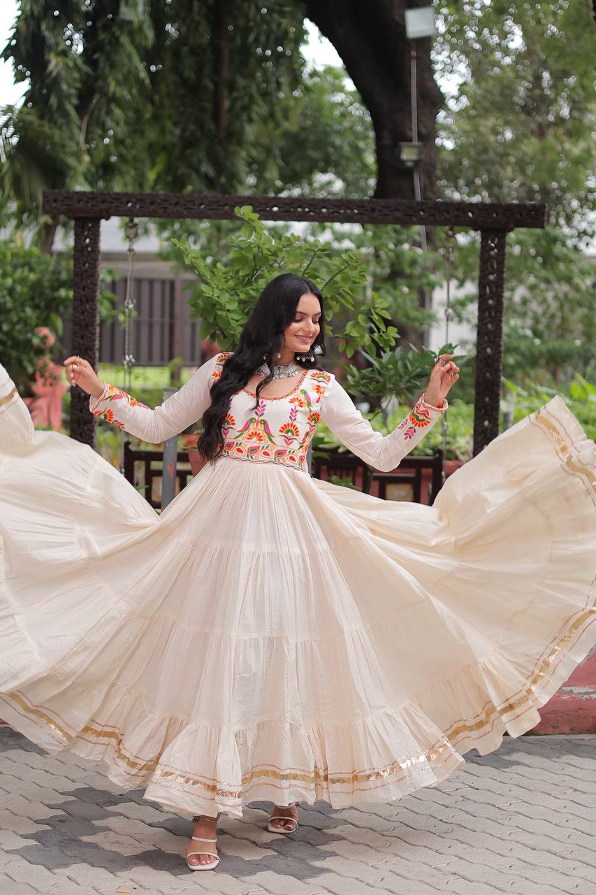 Aarvi's Grace Creamy Layers & Folk Bloom Embroidery Anarkali Gown