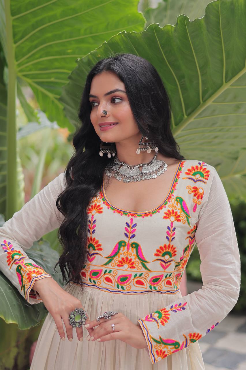 Aarvi's Grace Creamy Layers & Folk Bloom Embroidery Anarkali Gown