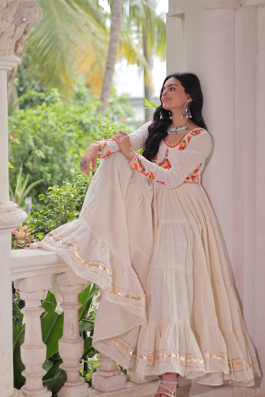 Aarvi's Grace Creamy Layers & Folk Bloom Embroidery Anarkali Gown