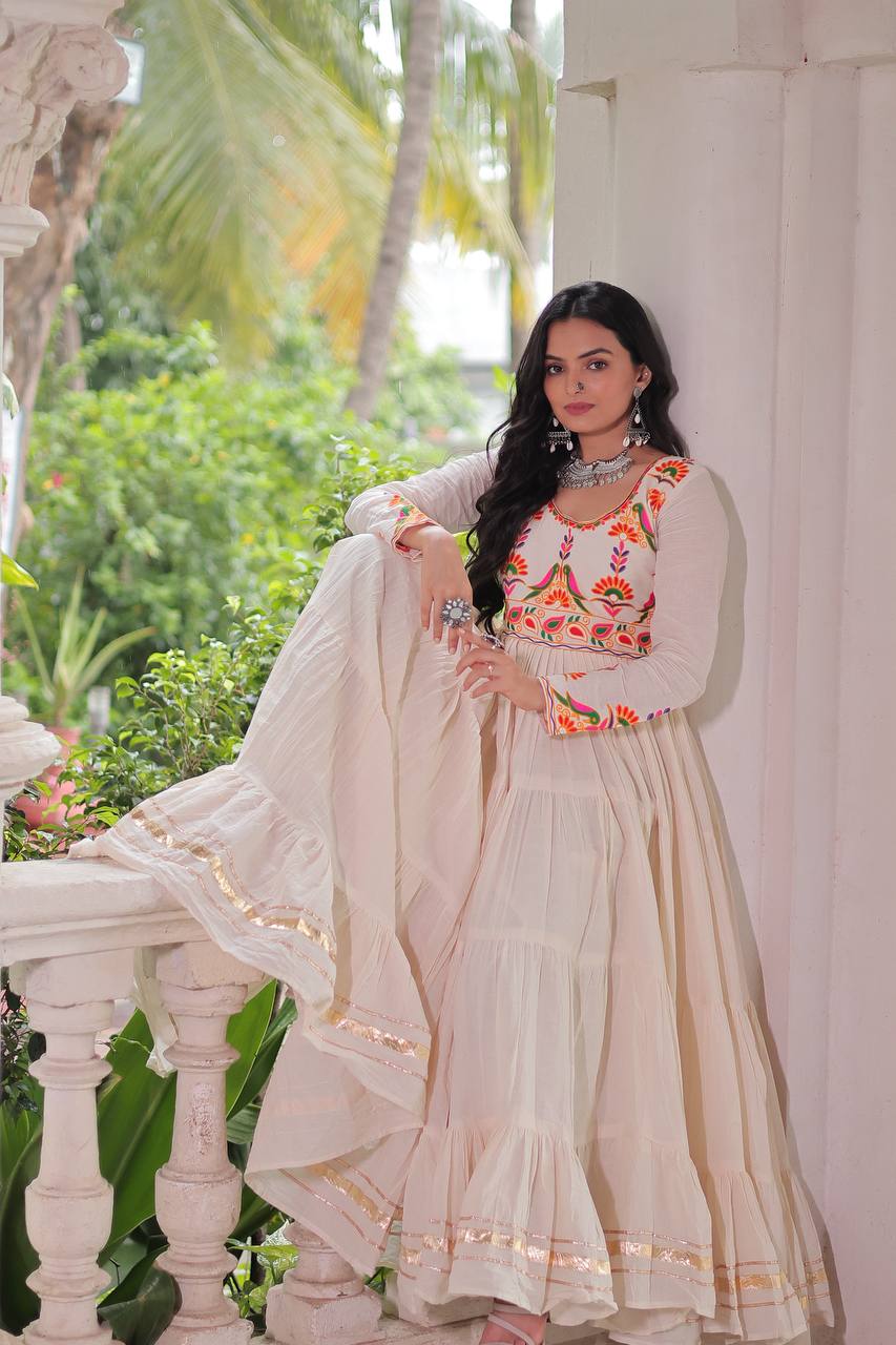 Aarvi's Grace Creamy Layers & Folk Bloom Embroidery Anarkali Gown