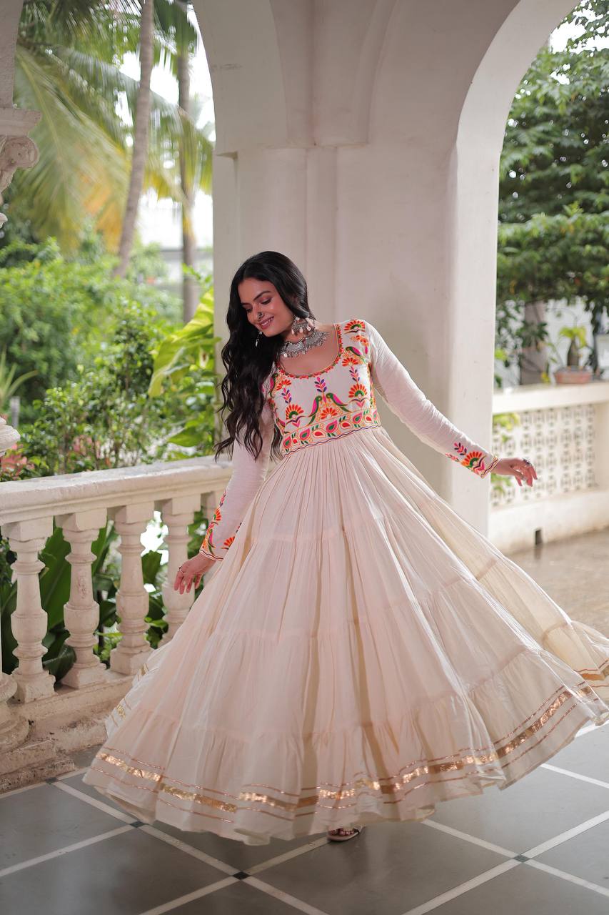 Aarvi's Grace Creamy Layers & Folk Bloom Embroidery Anarkali Gown