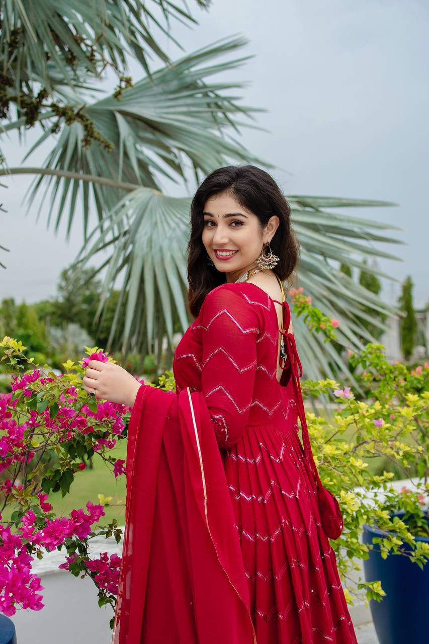 Grace in Every Twirl: Festive Red Magic Designer Anarkali Suit