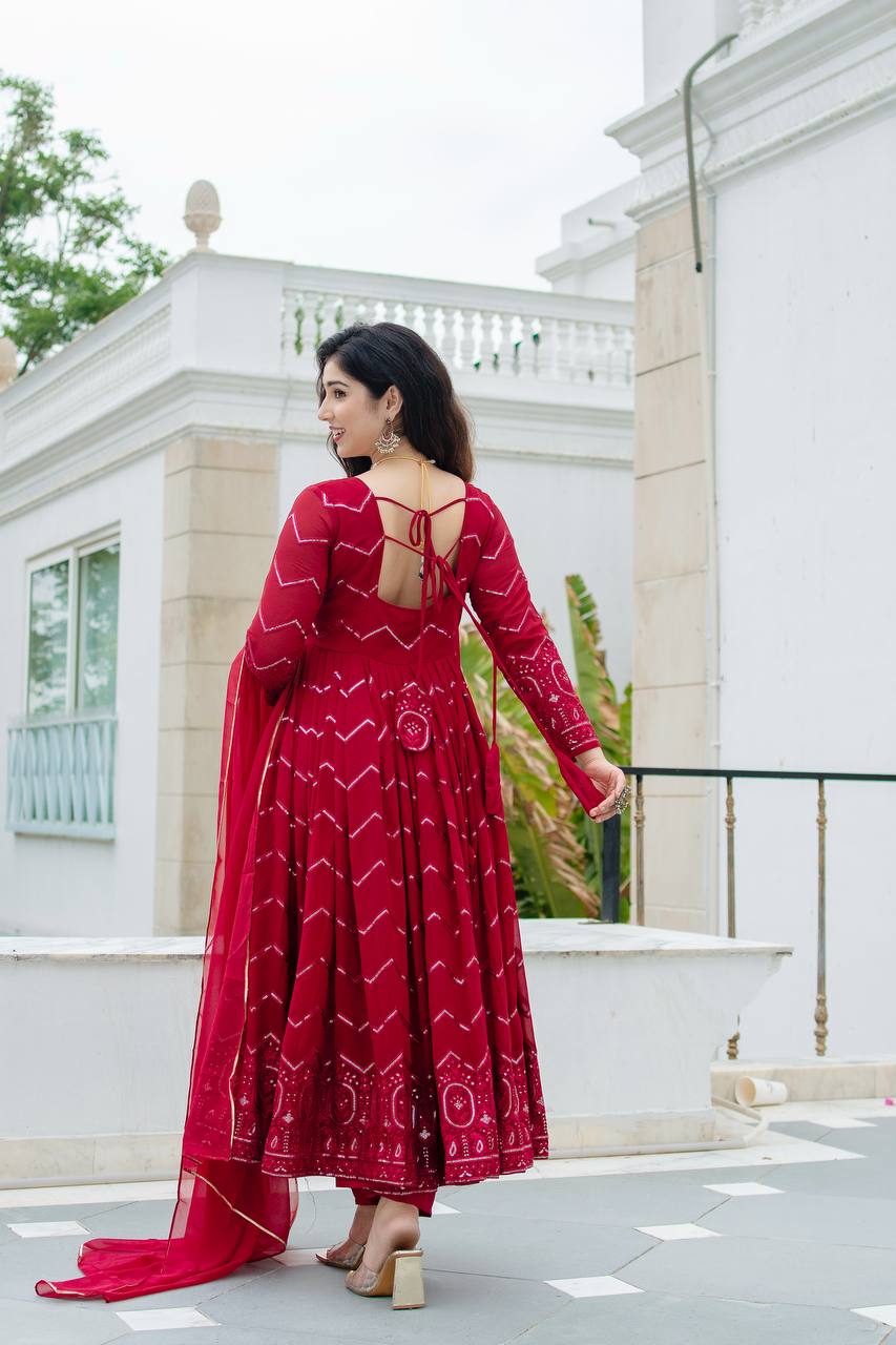 Grace in Every Twirl: Festive Red Magic Designer Anarkali Suit