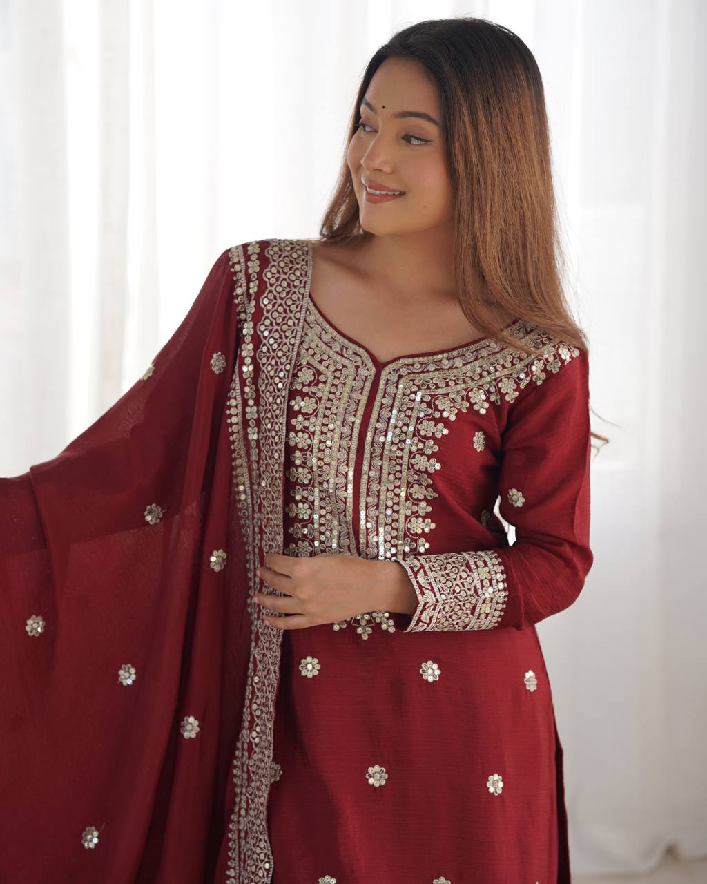 A Symphony of Ethnic Elegance Maroon And White Shararas