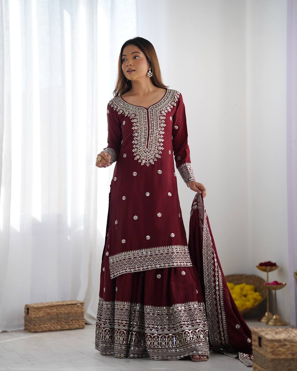 A Symphony of Ethnic Elegance Maroon And White Shararas