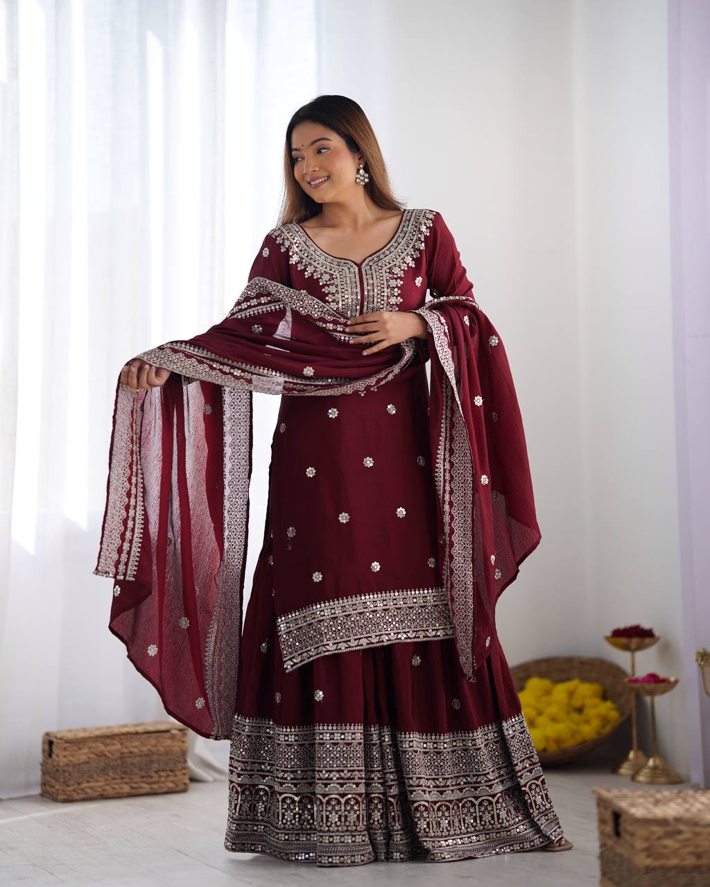 A Symphony of Ethnic Elegance Maroon And White Shararas