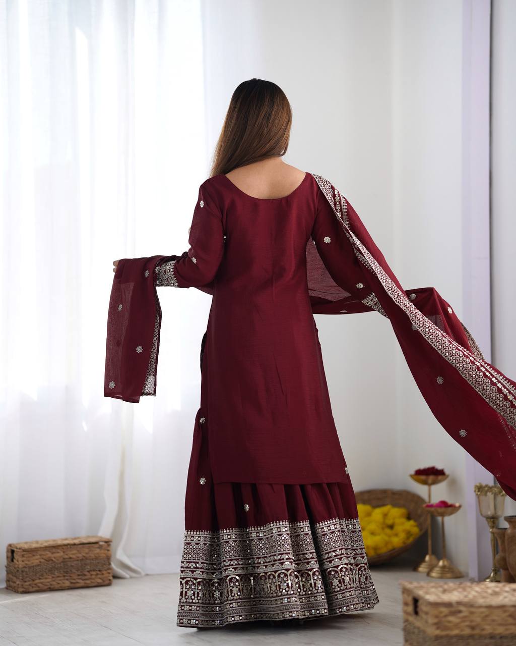 A Symphony of Ethnic Elegance Maroon And White Shararas