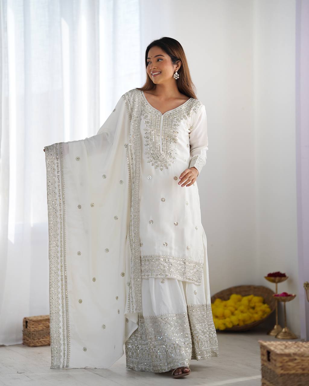 A Symphony of Ethnic Elegance Maroon And White Shararas