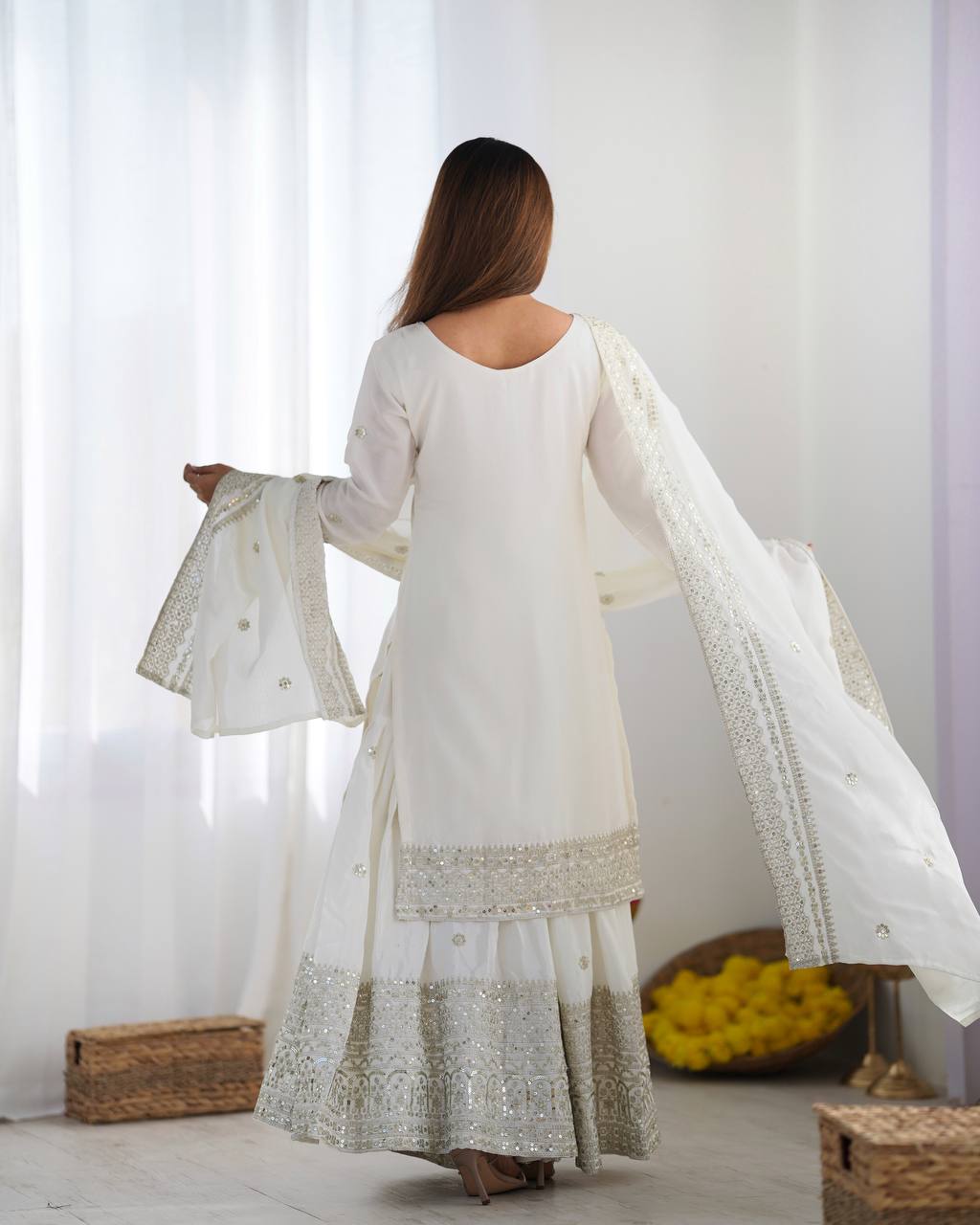 A Symphony of Ethnic Elegance Maroon And White Shararas