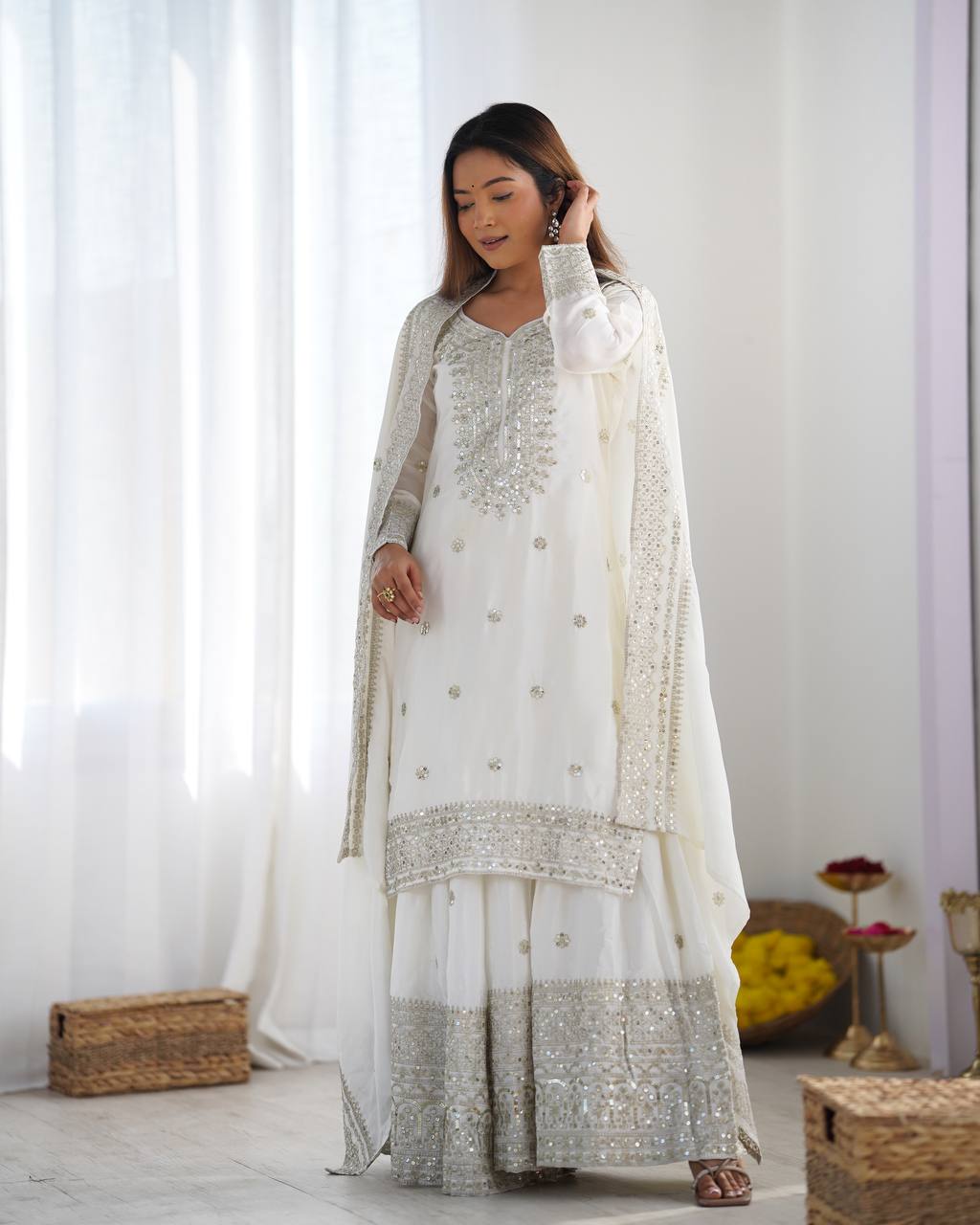 A Symphony of Ethnic Elegance Maroon And White Shararas