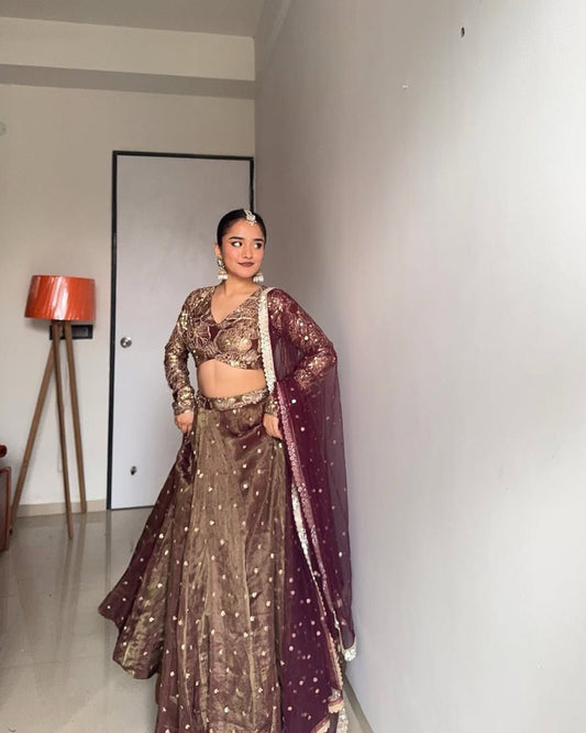 Regal Glow Maroon & Gold Embellished Lehenga Ensemble