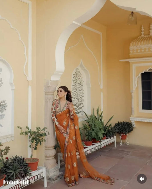 Sunset Royal Roots Traditional Charm  Embroidered Saree