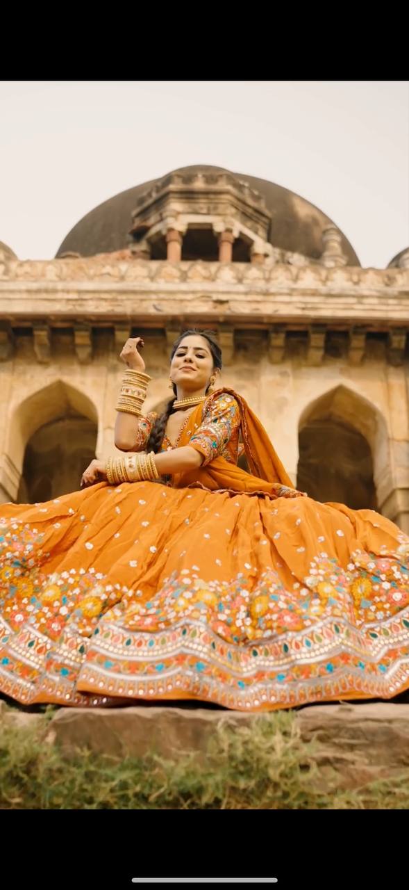 Kesar Charm Mustard Orange Festive Lehenga Choli