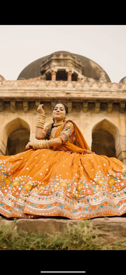 Kesar Charm Mustard Orange Festive Lehenga Choli