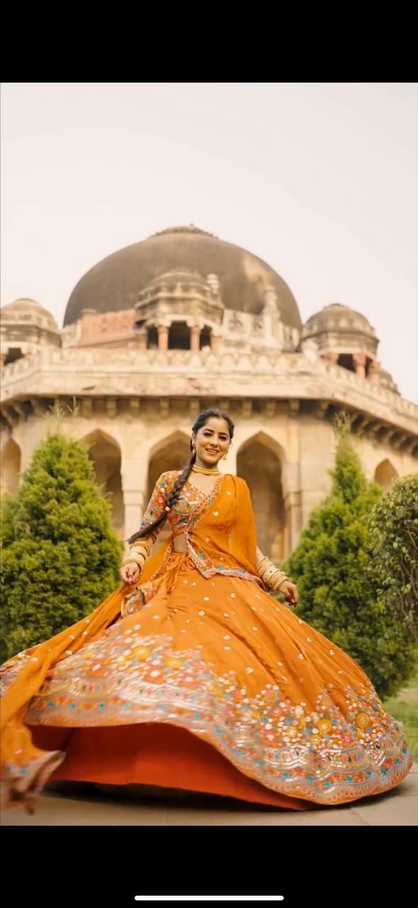 Kesar Charm Mustard Orange Festive Lehenga Choli