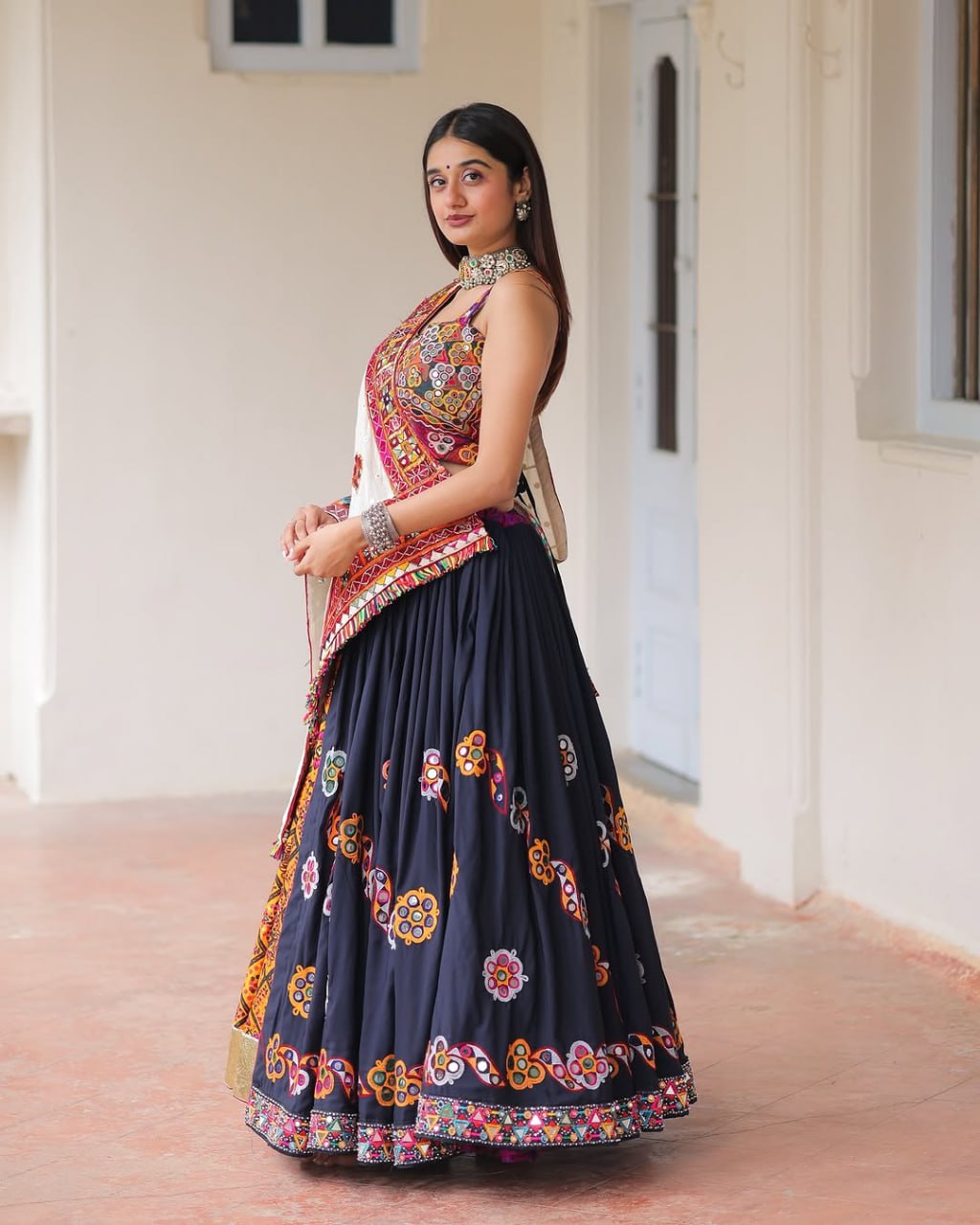 Traditional Vibrant Mirror Work Navratri Lehenga Choli