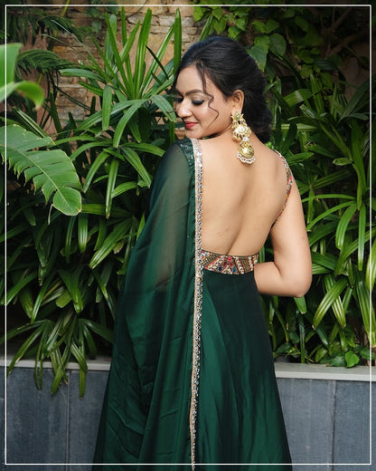 Nirva Designer Heavy Fux Georgette Sequins Zari Embroidery Gown