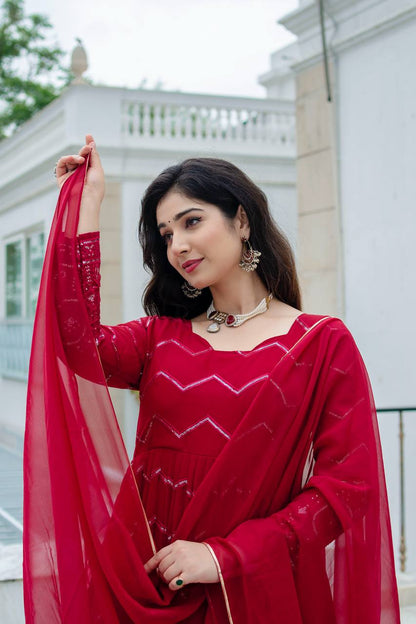 Grace in Every Twirl: Festive Red Magic Designer Anarkali Suit